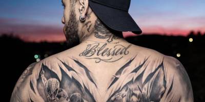 Tatuaje de Neymar, con Batman y el Hombre Araña